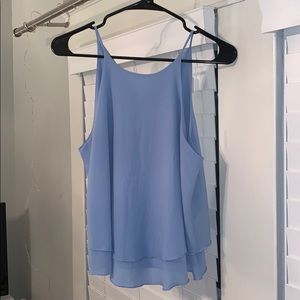 Julie billiart tank size L but fits like a S/M